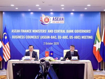 Bộ trưởng Bộ Tài chính Việt Nam Đinh Tiến Dũng và Thống đốc Ngân hàng Nhà nước Việt Nam Lê Minh Hưng đồng chủ trì Hội nghị.