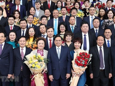 Thủ tướng Chính phủ Phạm Minh Chính gặp gỡ các doanh nghiệp, doanh nhân tiêu biểu hôm 12/12/2021 (Ảnh: TTXVN)