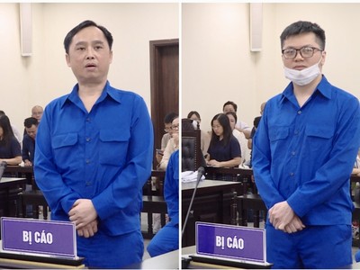 Hai bị cáo Đỗ Thành Nhân (trái) và Đỗ Đức Nam trước toà.