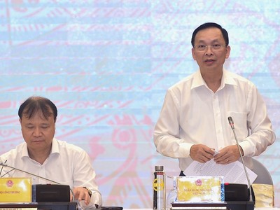 Phó Thống đốc NHNN Đào Minh Tú trả lời tại họp báo Chính phủ thường kỳ chiều 2/10 (Ảnh: Nhật Bắc)