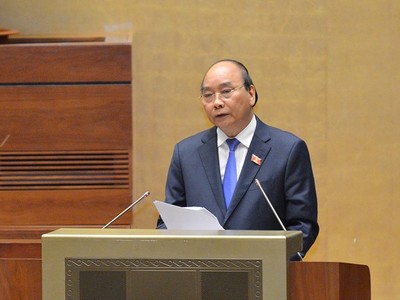 Thủ tướng Chính phủ Nguyễn Xuân Phúc phát biểu làm rõ thêm một số vấn đề liên quan thuộc trách nhiệm của Chính phủ trước khi trực tiếp trả lời chất vấn..