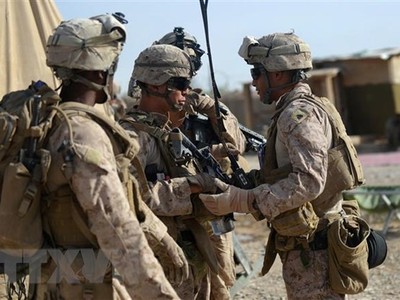 Binh sỹ Mỹ tuần tra tại khu vực Sangin, Afghanistan, ngày 12/6/2012. (Ảnh: AFP/TTXVN)