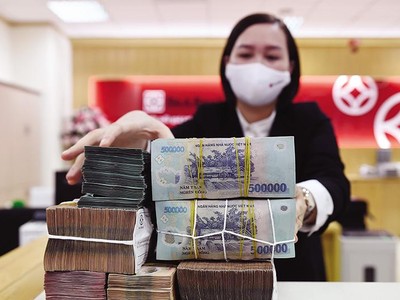 Nhiều ngân hàng vừa giảm lãi suất và xu hướng này được dự báo còn tiếp tục. Ảnh: Đức Thanh