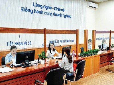 Bộ phận tiếp nhận hồ sơ đăng ký kinh doanh tại Sở Kế hoạch và Đầu tư Hải Phòng rất vắng người đến làm thủ tục do từ ngày 1/1/2021, toàn bộ thủ tục đã được thực hiện trực tuyến. Ảnh: Thanh Tân