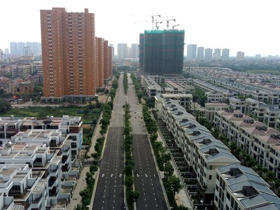 Hạ tầng phát triển sẽ thúc đẩy hình thành các đô thị vệ tinh, giúp giảm áp lực cho nội đô các thành phố lớn. Ảnh: Dũng Minh