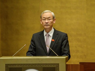 Chủ nhiệm Uỷ ban Tài chính - Ngân sách Nguyễn Phú Cường giải trình ý kiến đại biểu trước khi Quốc hội bấm nút .