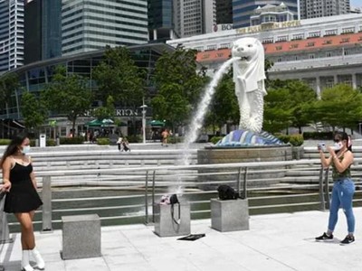 Du khách từ Hong Kong và Macao có thể đăng ký nhập cảnh Singapore ngay lập tức và được phép nhập cảnh vào Singapore ngay từ ngày 26/8 tới. Ảnh: AFP