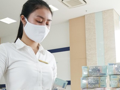 Thanh khoản hệ thống ngân hàng đang dồi dào, một phần bởi cho vay khó khăn trong bối cảnh dịch Covid-19 diễn biến phức tạp