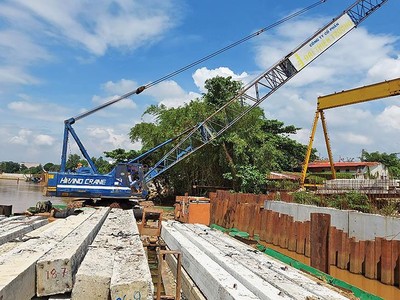 Bình Dương đang tập trung nâng cao chất lượng giải ngân các dự án đầu tư công. Trong ảnh: Dự án kè sông Đồng Nai