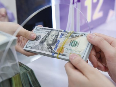 Về cơ bản, VND vẫn cho thấy sức mạnh thông qua nguồn cung ngoại tệ vào Việt Nam đang duy trì tích cực. Ảnh: Dũng Minh