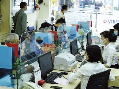 Tính đến cuối năm 2021, dư nợ cho vay nền kinh tế của BIDV đạt 1,33 triệu tỷ đồng. Ảnh: Đức Thanh