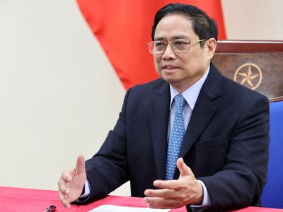 Thủ tướng Phạm Minh Chính điện đàm với Thủ tướng Trung Quốc Lý Khắc Cường ngày 13/1 (Ảnh: Nhật Bắc)