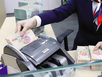 Nợ xấu và trích lập dự phòng tại nhiều ngân hàng đã được cải thiện vượt bậc. Ảnh: Đức Thanh