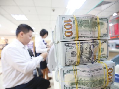 Mỹ tăng lãi suất USD là nguyên nhân chính khiến đồng bạc xanh lên giá so với các đồng tiền khác. Ảnh: Dũng Minh