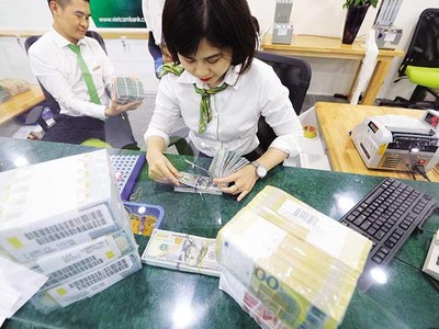 Tỷ giá VND/USD biến động khá mạnh trong tháng 7/2022. Ảnh: Đức Thanh