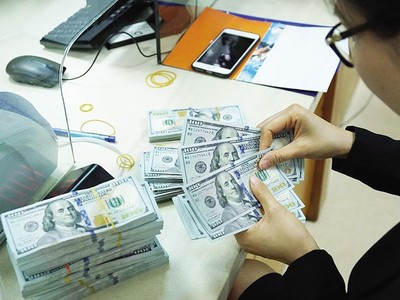 Việt Nam hoàn toàn có thể tùy cơ ứng biến, điều chỉnh tỷ giá trượt theo sức ép. Ảnh: Đức Thanh