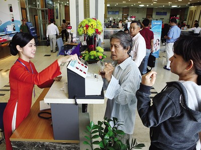 Tranh cãi về mức room ngoại tại Sacombank đến nay vẫn chưa ngã ngũ. Ảnh: Đức Thanh