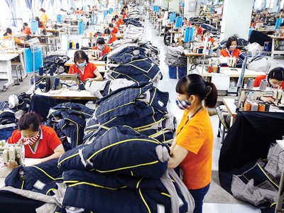 Doanh nghiệp dệt may đang rất khó khăn do đơn hàng xuất khẩu giảm mạnh Ảnh: Đức Thanh