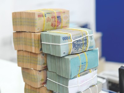 Việc xác định tiền sử dụng đất ách tắc kéo dài khiến cả “núi” tiền bị chôn trong các dự án bất động sản. Ảnh: Dũng Minh 