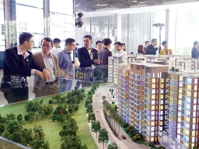 Quy định mua bán bất động sản phải thông qua sàn giao dịch gây lo ngại làm tăng chi phí cho khách hàng Ảnh: Hải Phong