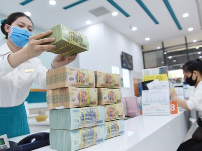 Biên lãi ròng bình quân ngành ngân hàng trong quý II/2023 là 3,43%. Ảnh: Dũng Minh 