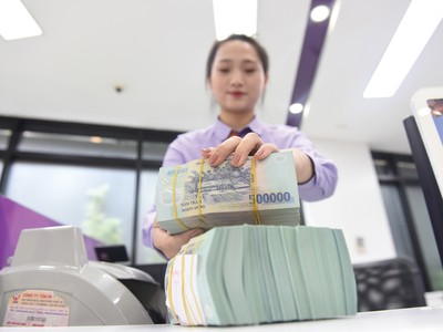 Lãi suất thấp sẽ tạo ra tiền rẻ, nhưng cần kiểm soát được rủi ro tín dụng và hướng vào hoạt động sản xuất - kinh doanh. Ảnh: Dũng Minh 