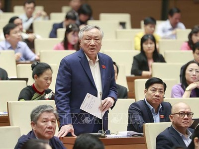 Sáng 20/11, Chánh án Tòa án Nhân dân Tối cao Nguyễn Hòa Bình giải trình, làm rõ một số vấn đề đại biểu Quốc hội nêu tại phiên họp. Ảnh: Doãn Tấn/TTXVN