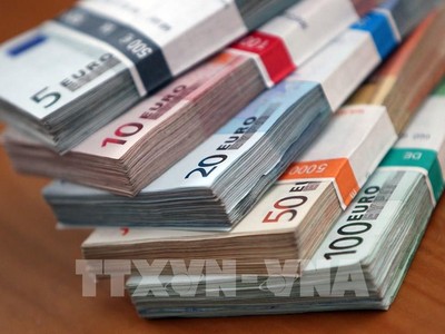 Đồng euro tại ngân hàng ở Heidelberg, Đức. Ảnh: AFP/TTXVN