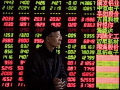 Cả hai sàn giao dịch chứng khoán Thượng Hải và Thâm Quyến đều ra thông báo rằng họ sẽ tăng cường giám sát các giao dịch được thực hiện bởi các quỹ định lượng. Ảnh: AFP