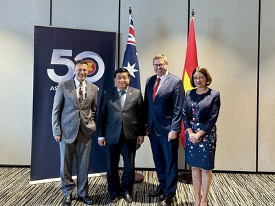 Bộ trưởng Bộ Kế hoạch và Đầu tư Nguyễn Chí Dũng gặp, làm việc với ông Pat Conroy, Bộ trưởng Phát triển quốc tế và Thái Bình Dương của Australia. (Ảnh: MPI)