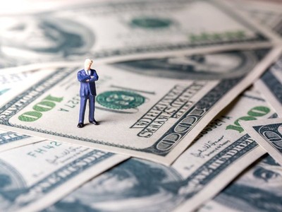 Theo tính toán của Bloomberg, để lọt vào 1% tinh hoa là những người giàu có nhất nước Mỹ, cần kiếm được khoảng 488.000 USD/năm. Ảnh minh hoạ. (Nguồn: Internet)