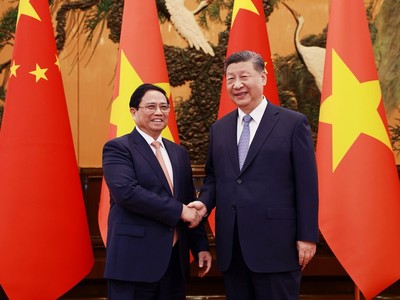 Thủ tướng Phạm Minh Chính hội kiến Tổng Bí thư Ban Chấp hành Trung ương Đảng Cộng sản Trung Quốc, Chủ tịch nước Cộng hòa nhân dân Trung Hoa Tập Cận Bình. (Ảnh: Nhật Bắc)