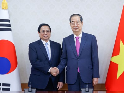 Thủ tướng Phạm Minh Chính và Thủ tướng Han Duck Soo. (Ảnh: Nhật Bắc)