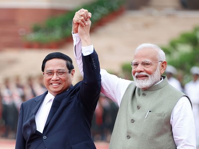 Thủ tướng Ấn Độ Narendra Modi nhiệt liệt chào đón Thủ tướng Phạm Minh Chính thăm cấp Nhà nước tới Ấn Độ. (Ảnh: Nhật Bắc)