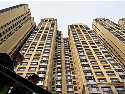 Các tòa nhà do Tập đoàn bất động sản Evergrande xây dựng tại Bắc Kinh, Trung Quốc, ngày 8/12/2021. Ảnh: AFP/TTXVN