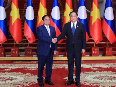 Thủ tướng Chính phủ Phạm Minh Chính và Thủ tướng Lào Sonexay Siphandone. Ảnh: Nhật Bắc 