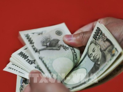Đồng tiền mệnh giá 10.000 yen của Nhật Bản. (Ảnh: AFP/TTXVN)