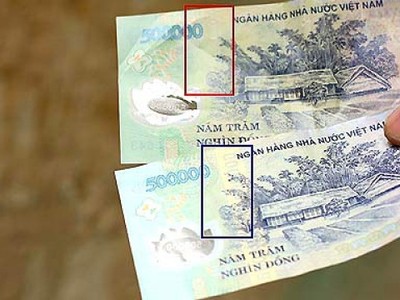 Ngân hàng phải báo công an khi phát hiện ít nhất 5 tờ tiền giả trong một giao dịch 