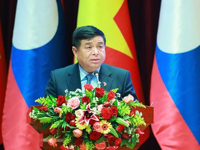 Bộ trưởng Bộ Kế hoạch và Đầu tư Nguyễn Chí Dũng, Chủ tịch Ủy ban hợp tác Việt Nam - Lào. Ảnh: MPI