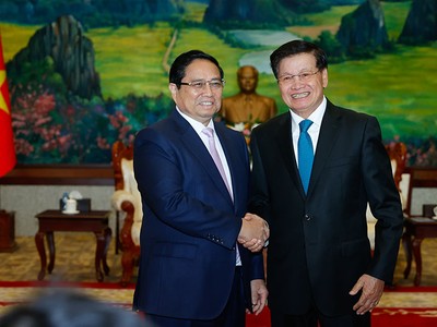 Thủ tướng Phạm Minh Chính hội kiến Tổng Bí thư, Chủ tịch nước Lào Thongloun Sisoulith. Ảnh: Nhật Bắc