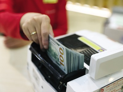 Việc nới tỷ giá sẽ mở ra không gian để NHNN linh hoạt điều hành chính sách tiền tệ. Ảnh: Đức Thanh 