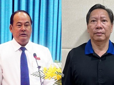 Bị can Nguyễn Thanh Bình (bên trái), cựu Chủ tịch UBND tỉnh An Giang, hầu tòa với cáo buộc "Lợi dụng chức vụ, quyền hạn trong khi thi hành công vụ".