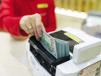 Doanh nghiệp cần chủ động xây dựng kế hoạch ứng phó với biến động tỷ giá. Ảnh: Đức Thanh 