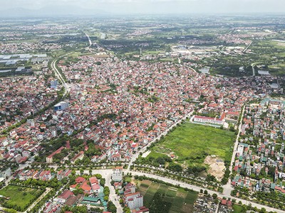 Tại Kỳ họp thứ chín của Quốc hội, Bộ trưởng Bộ Tài chính thừa ủy quyền của Thủ tướng Chính phủ trình Quốc hội sửa đổi, bổ sung một số điều của Luật Quy hoạch. Trong ảnh: Hạ tầng khu vực huyện Đan Phượng (Hà Nội) 