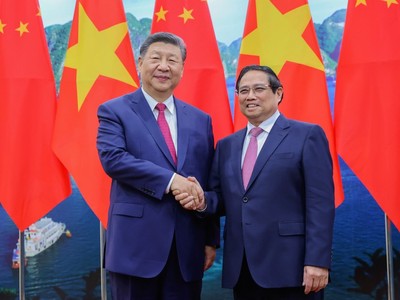 Thủ tướng Phạm Minh Chính và Tổng Bí thư, Chủ tịch nước Trung Quốc Tập Cận Bình. Ảnh: Nhật Bắc 