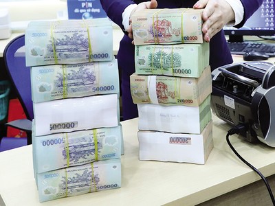 Nợ xấu đang có xu hướng tăng lên, ảnh hưởng đến hoạt động ngân hàng và mặt bằng lãi suất. Ảnh: Đức Thanh 