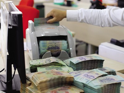 Việc sửa đổi đồng bộ hành lang pháp lý về xử lý nợ xấu sẽ kích thích thị trường nợ phát triển. Ảnh: Đức Thanh 