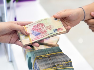 Tiền đồng chịu sức ép giảm giá từ nay tới cuối năm