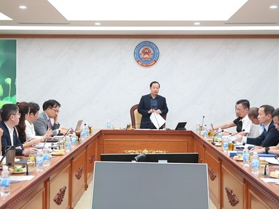 Cục trưởng Cục Quản lý nợ và tài chính đối ngoại Nguyễn Quốc Phương phát biểu tại hội nghị. (Ảnh: Đức Minh)