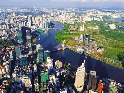 Trung tâm Tài chính quốc tế tại TP.HCM có diện tích khoảng 898 ha, thuộc địa giới hành chính phường Sài Gòn, phường Bến Thành, Khu đô thị mới Thủ Thiêm thuộc phường An Khánh. Trong ảnh: Khu vực ven sông Sài Gòn, Khu đô thị Thủ Thiêm. Ảnh: Lê Toàn 